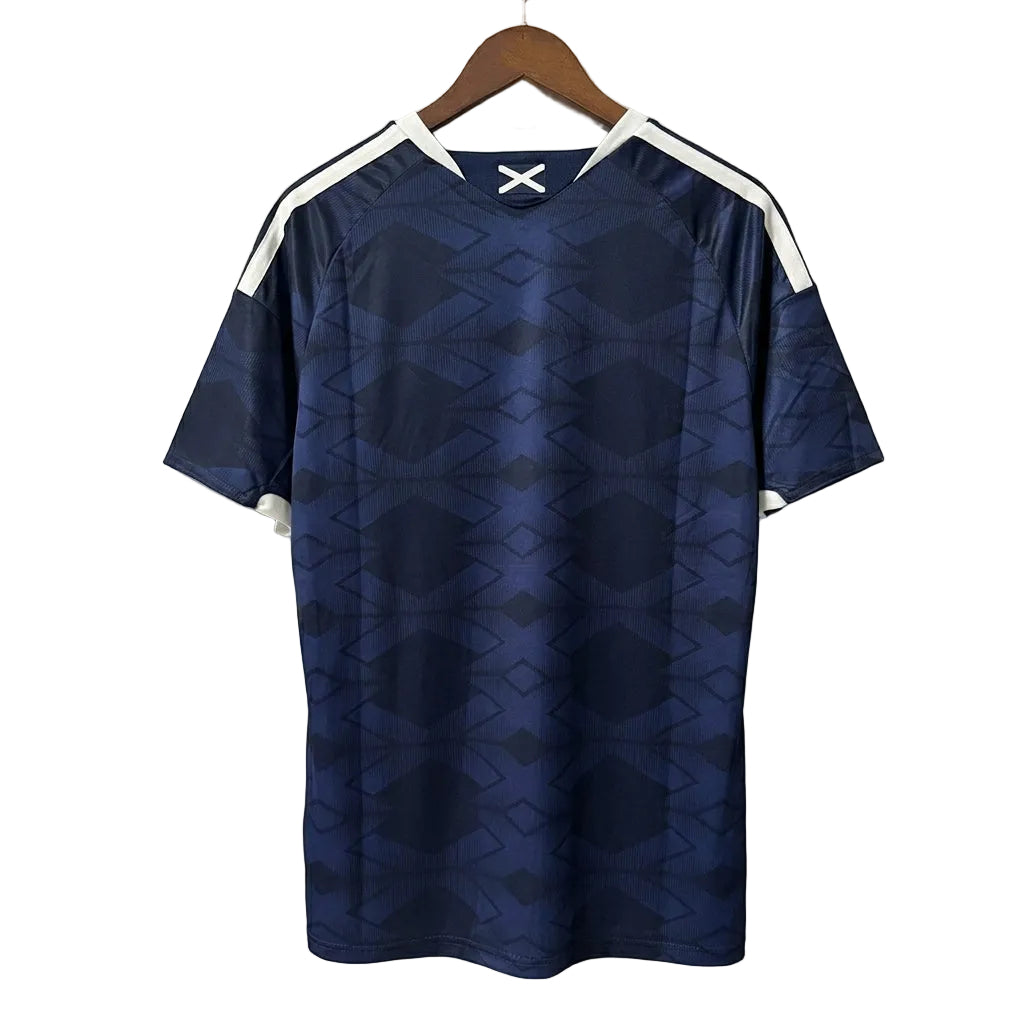 Blue sports jersey with white accents on a hanger against a gray background
