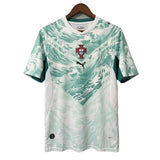 Green and white sports jersey with a logo on a gray background