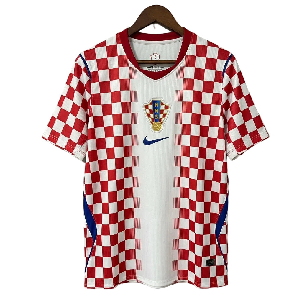 Red and white checkered sports jersey with Nike logo on a gray background