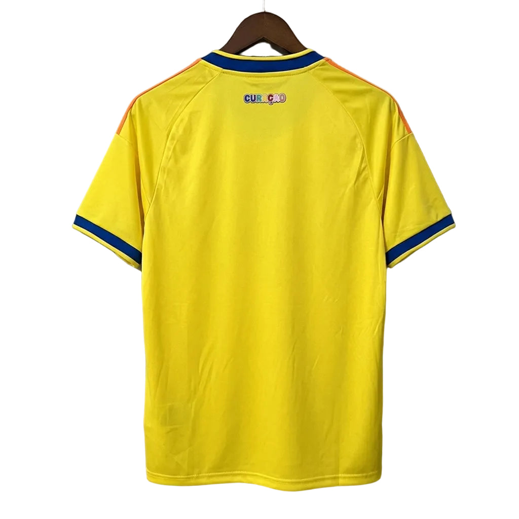 Yellow sports jersey with blue and red accents on a gray background