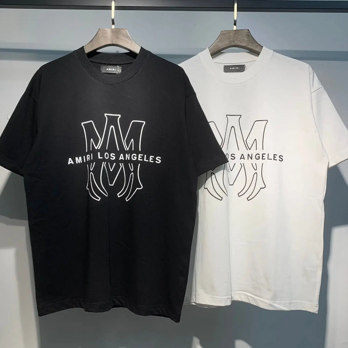 Black and white options Amiri Designer logo print Los Angeles T-shirts. Buy 3 get 1 FREE Gorilla fits