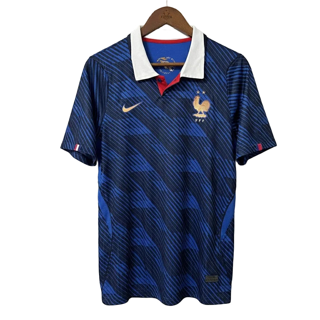 Blue sports jersey with Nike logo on a hanger against a gray background